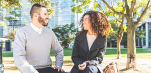 Business woman and man talking